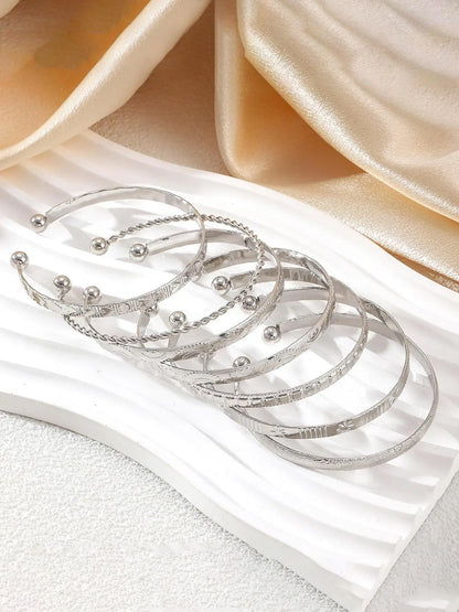 7-piece luxury-leaning exaggerated twisted open bangle set Suitable for parties, dates, daily wear, and ideal as a gift.